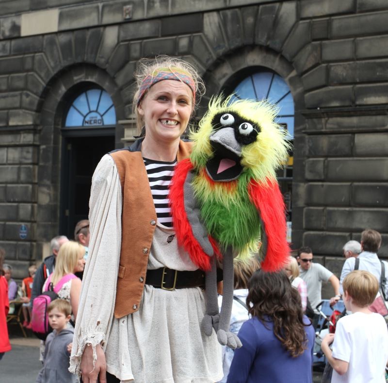 Actor with parrot at Edinburgh Festival